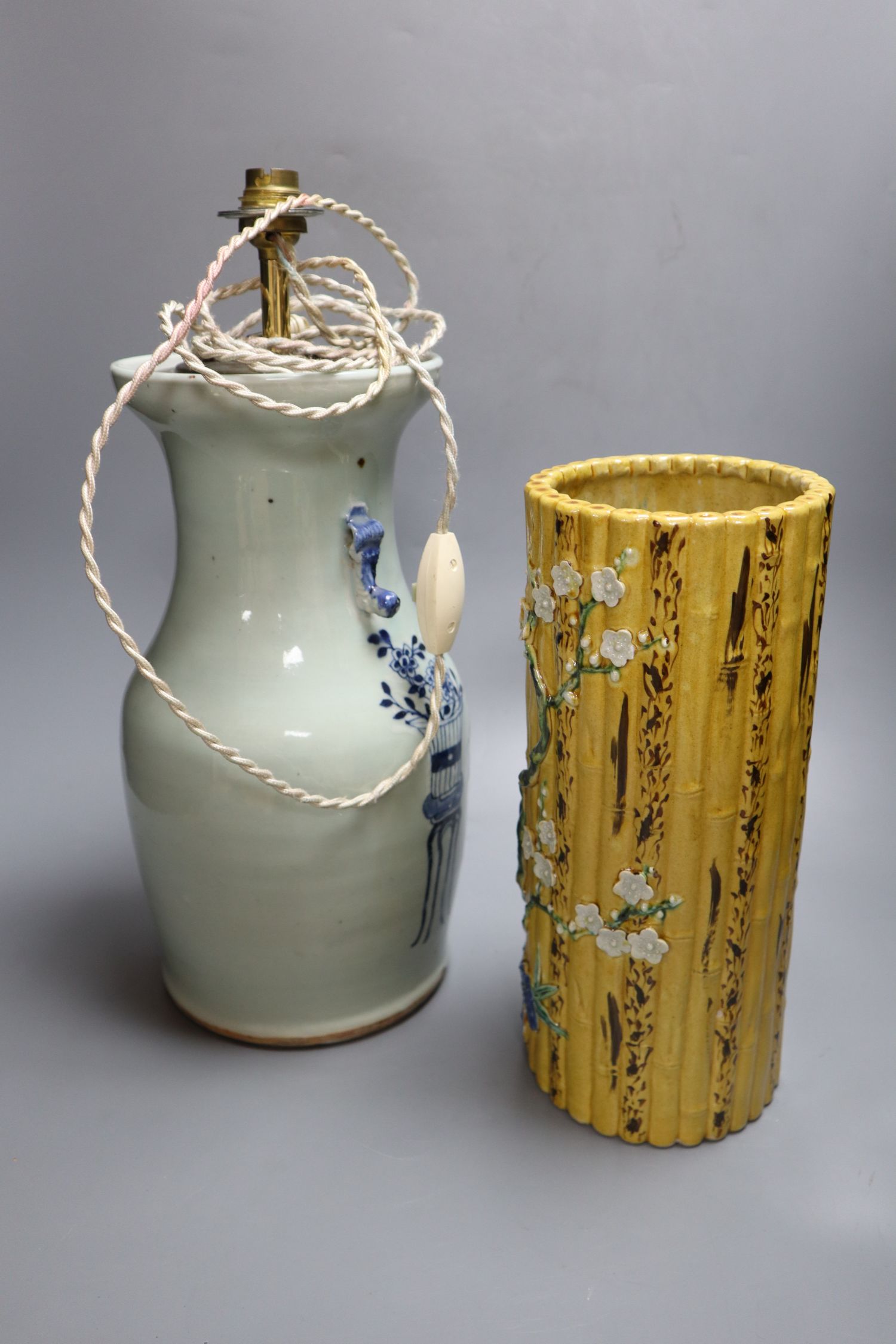 A Chinese blue and white converted lamp, together with a yellow ground cylindrical vase, tallest 33cm